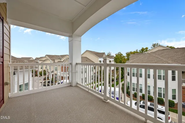 a view of balcony with furniture