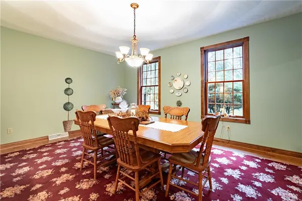 a view of a dining room with furniture