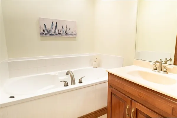 a bathroom with a sink and a bathtub