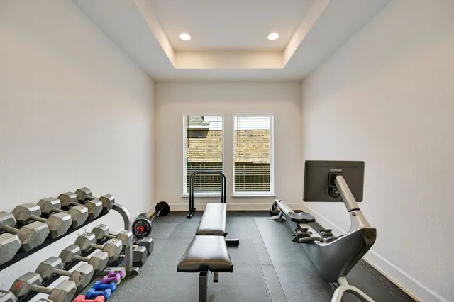 a room with furniture and a large window