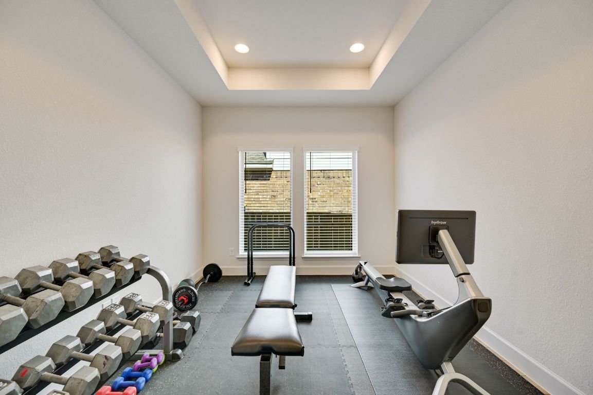 273 Fawn Riv Run Kyle, TX 78640 - Photo 15 of 27 a room with furniture and a large window