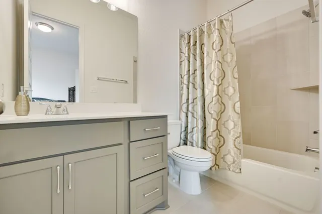 a bathroom with a sink a toilet and a bathtub