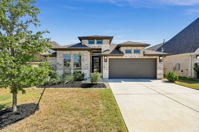 a front view of house with yard