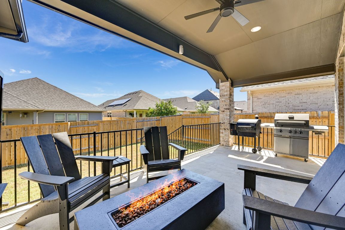 273 Fawn Riv Run Kyle, TX 78640 - Photo 21 of 27 a view of a balcony with chairs
