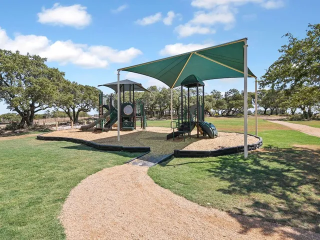 a view of a park with slide