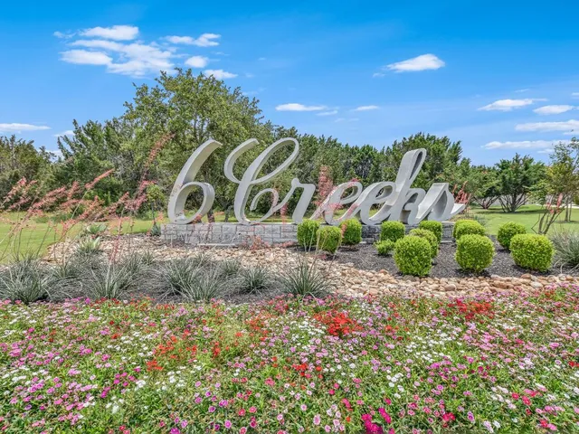 a view of a pathway with a yard