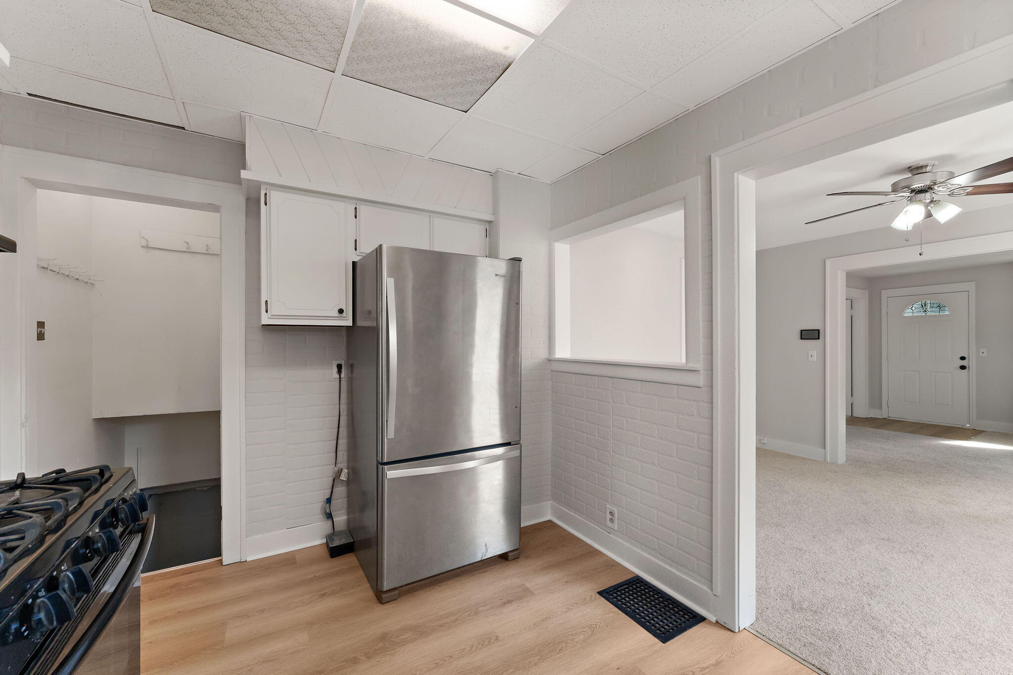 511 North West Street Crown Point, IN 46307 - Photo 15 of 17 a kitchen with stainless steel appliances a refrigerator and wooden floor