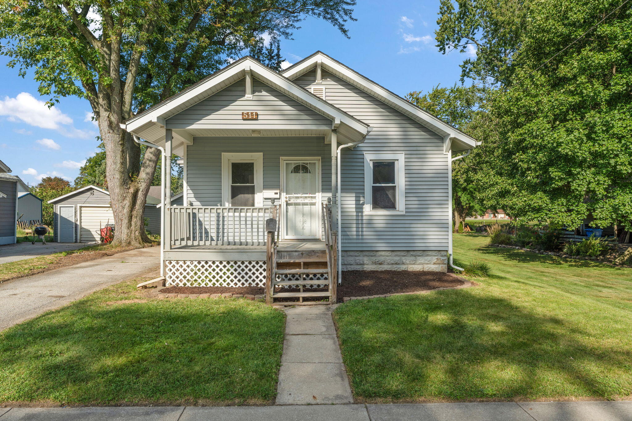 511 North West Street Crown Point, IN 46307 - Photo 3 of 17 a front view of a house with a yard