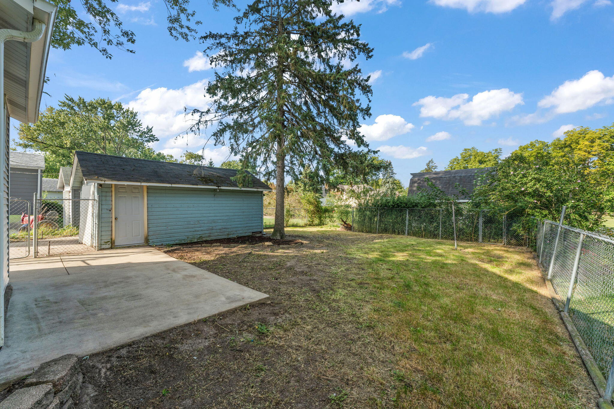 511 North West Street Crown Point, IN 46307 - Photo 6 of 17 a view of back yard of the house