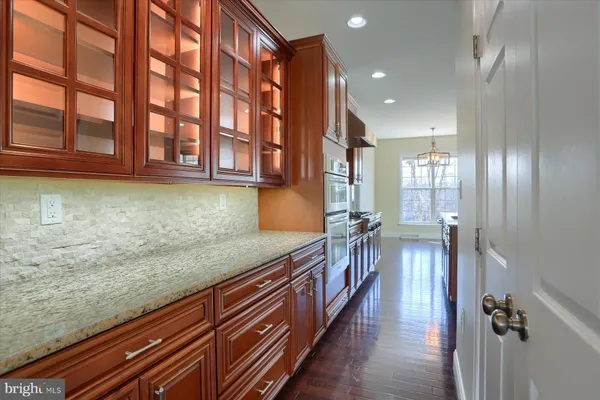 a view of a kitchen with lots of counter space