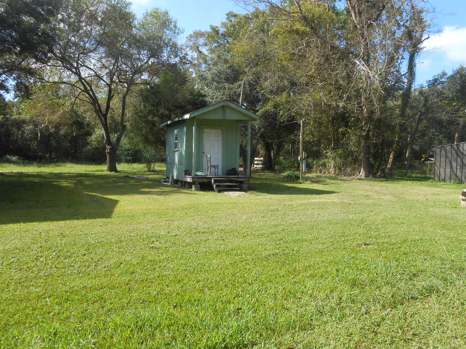 6435 County Road 42 Rosharon, TX 77583 - Photo 3 of 5 a view of a house with a yard and tree s