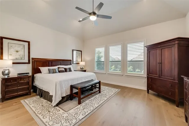 a bed room with a bed and a window