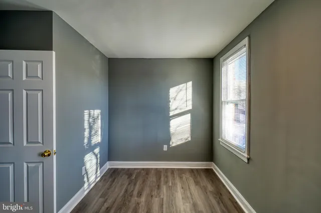 a view of hallway with windows