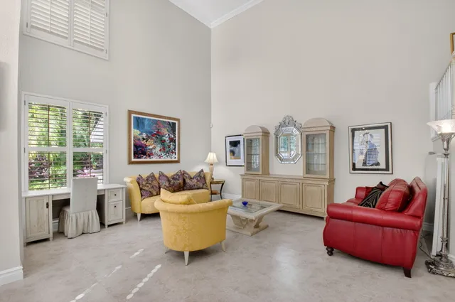 a kitchen with stainless steel appliances granite countertop a stove microwave and sink