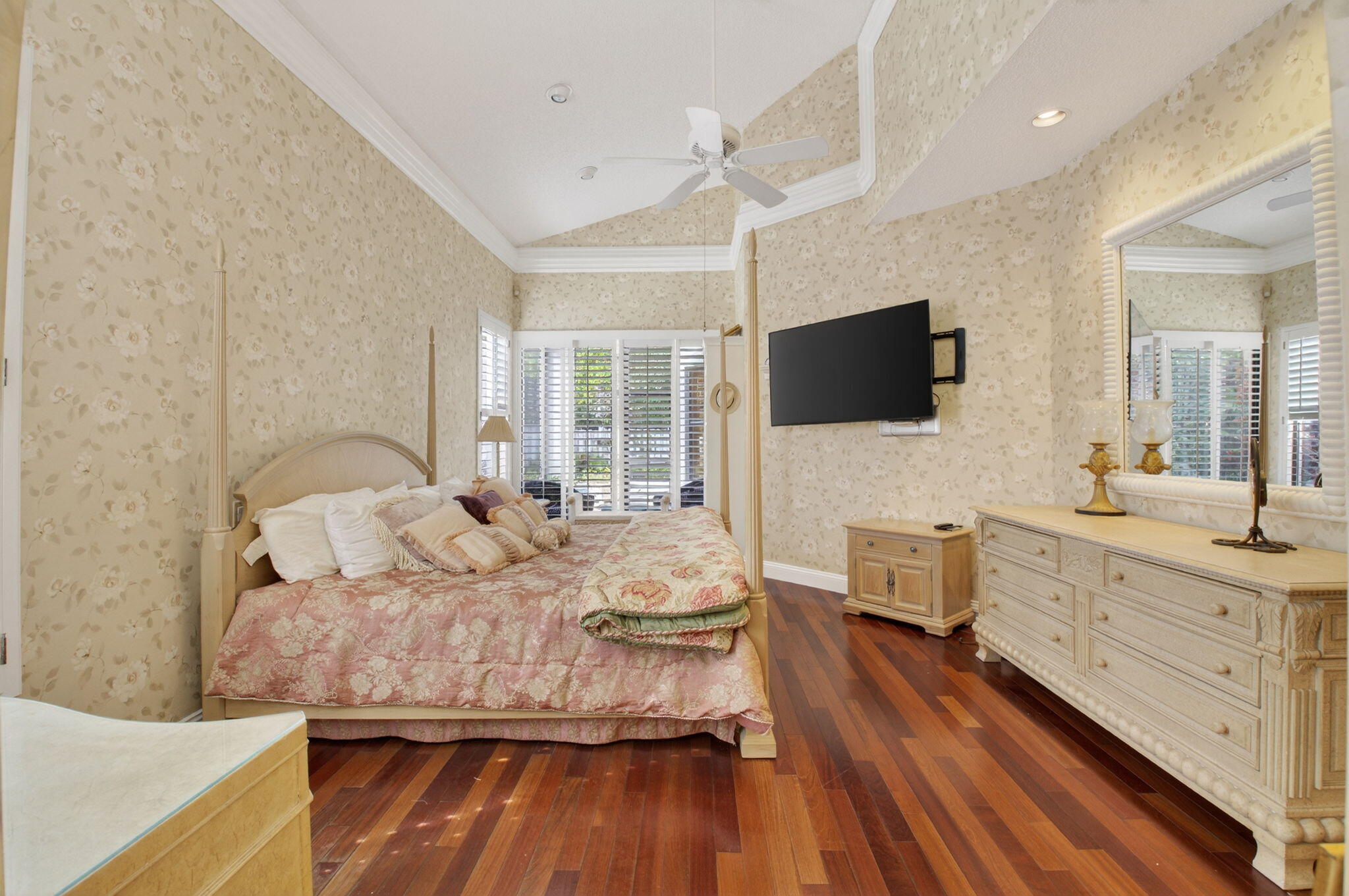 6395 Northwest 24th Avenue Boca Raton, FL 33496 - Photo 26 of 88 a living room with furniture and a flat screen tv