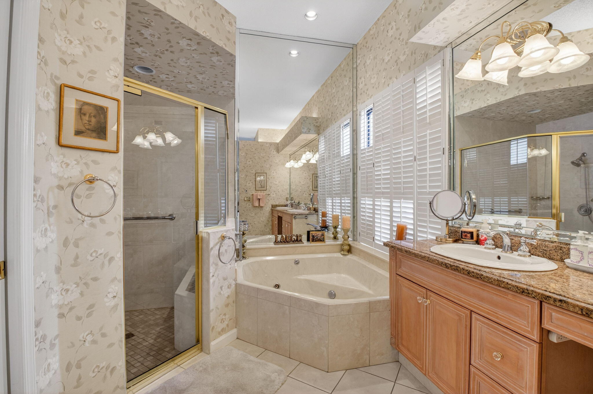 6395 Northwest 24th Avenue Boca Raton, FL 33496 - Photo 27 of 88 a bathroom with a bathtub shower sink and mirror