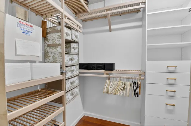 an aerial view of multiple houses with yard