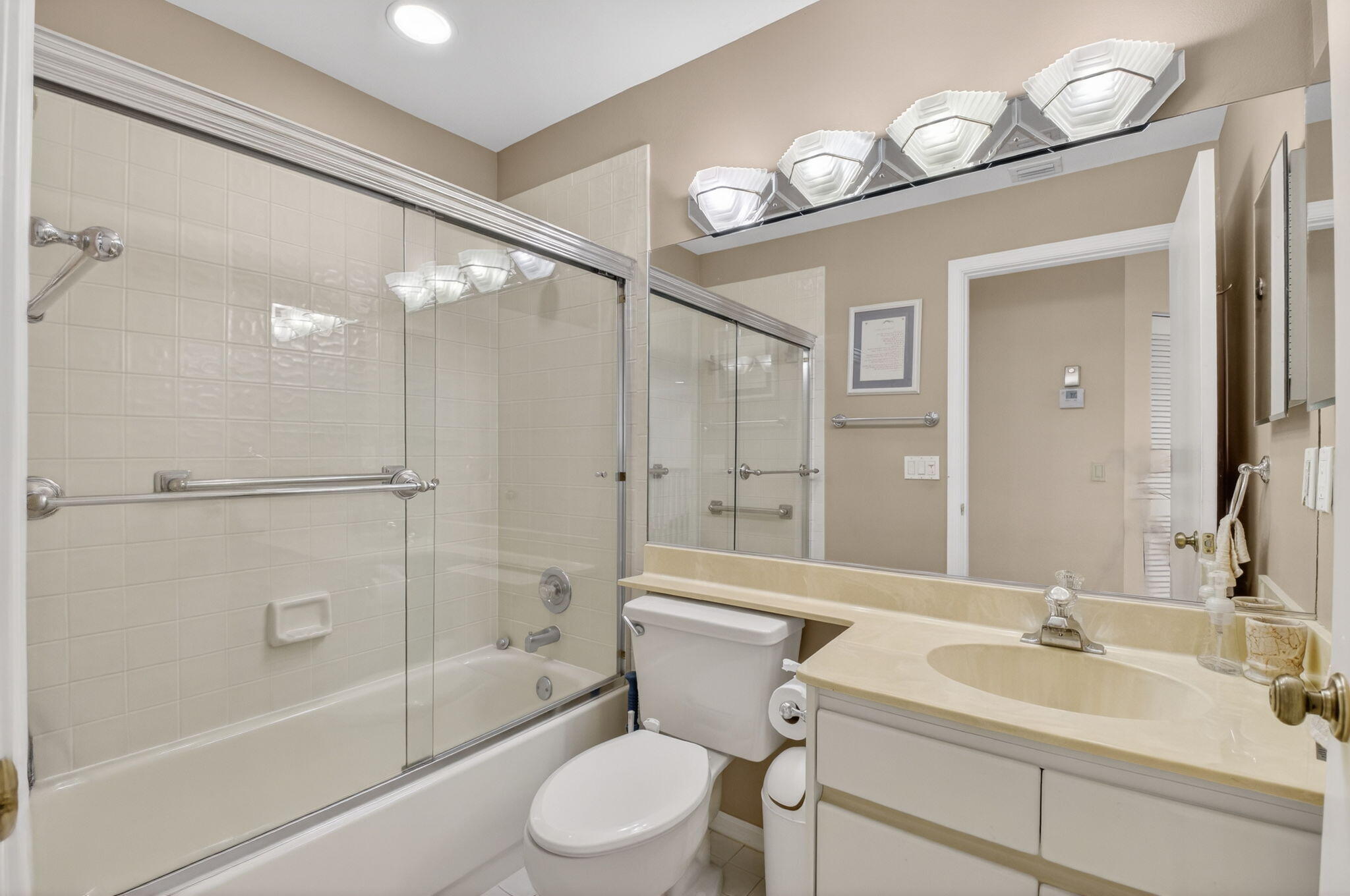 6395 Northwest 24th Avenue Boca Raton, FL 33496 - Photo 34 of 88 a bathroom with a sink a toilet and shower