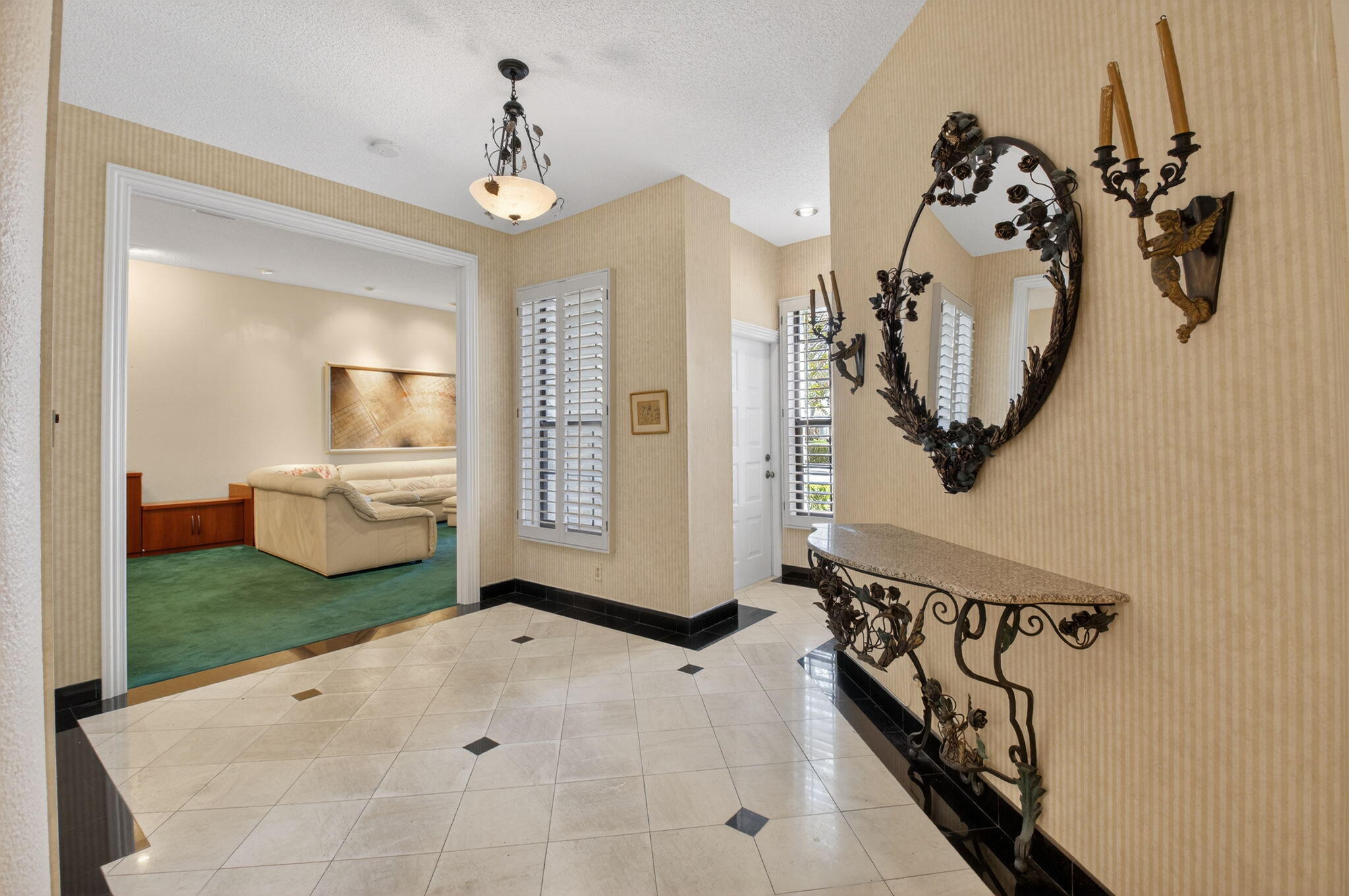 6395 Northwest 24th Avenue Boca Raton, FL 33496 - Photo 7 of 88 a view of a hallway with a livingroom