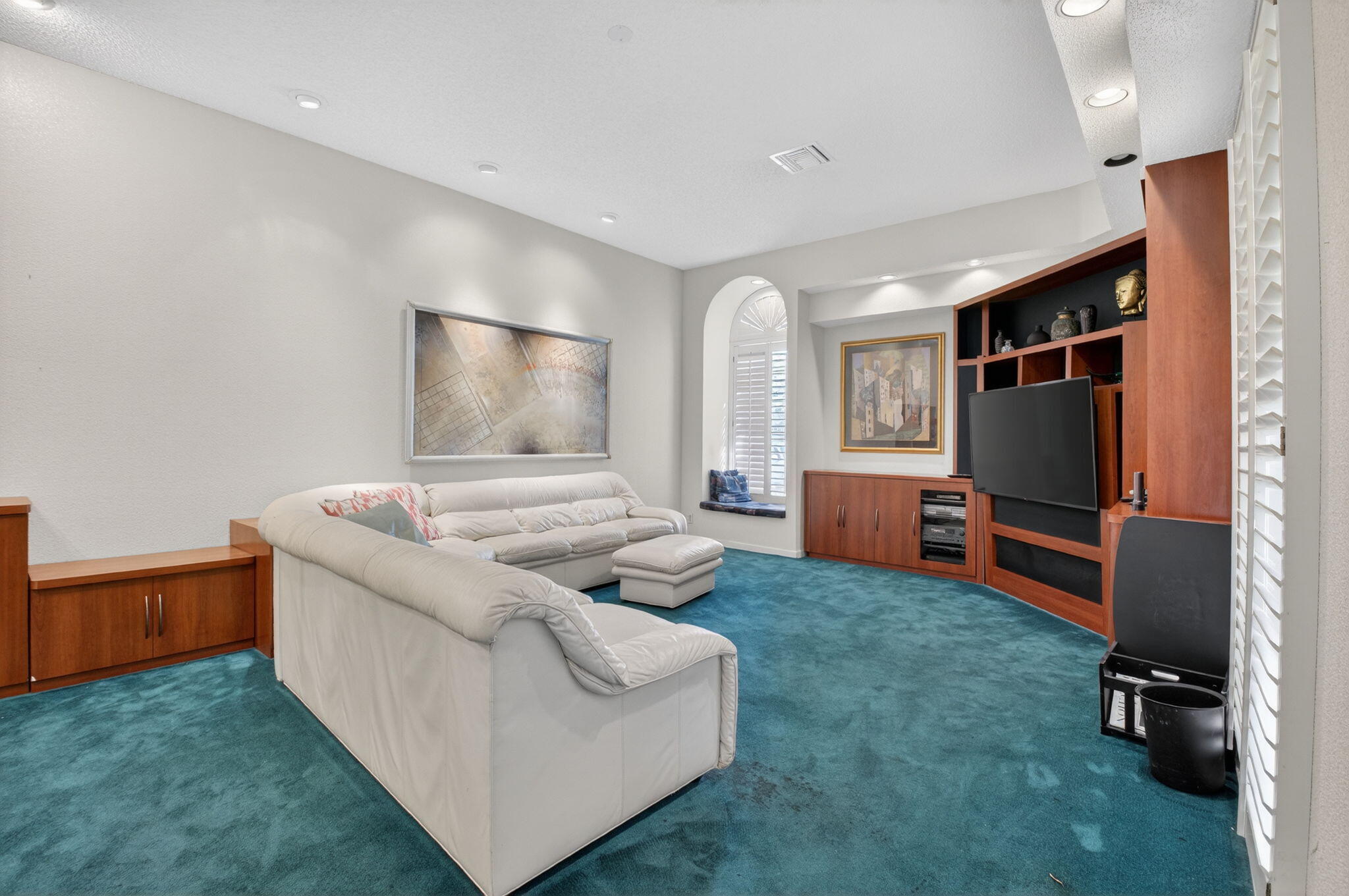 6395 Northwest 24th Avenue Boca Raton, FL 33496 - Photo 8 of 88 a living room with furniture and a flat screen tv