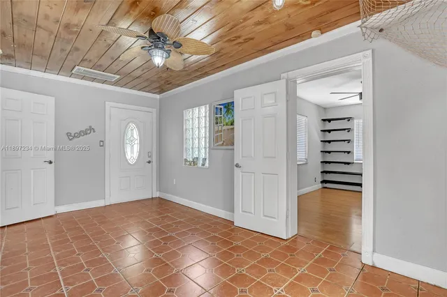 en empty room with windows