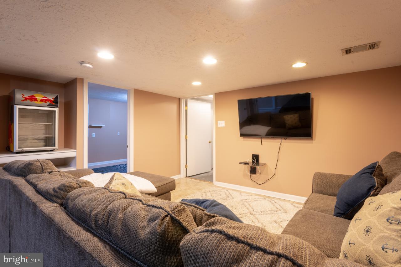 2125 Oak Road Port Republic, MD 20676 - Photo 29 of 39 Lower Level Family Room