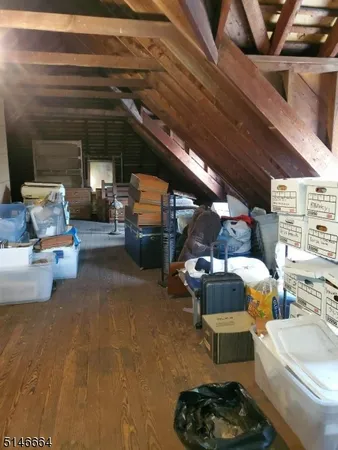 a children room with furniture and a couch
