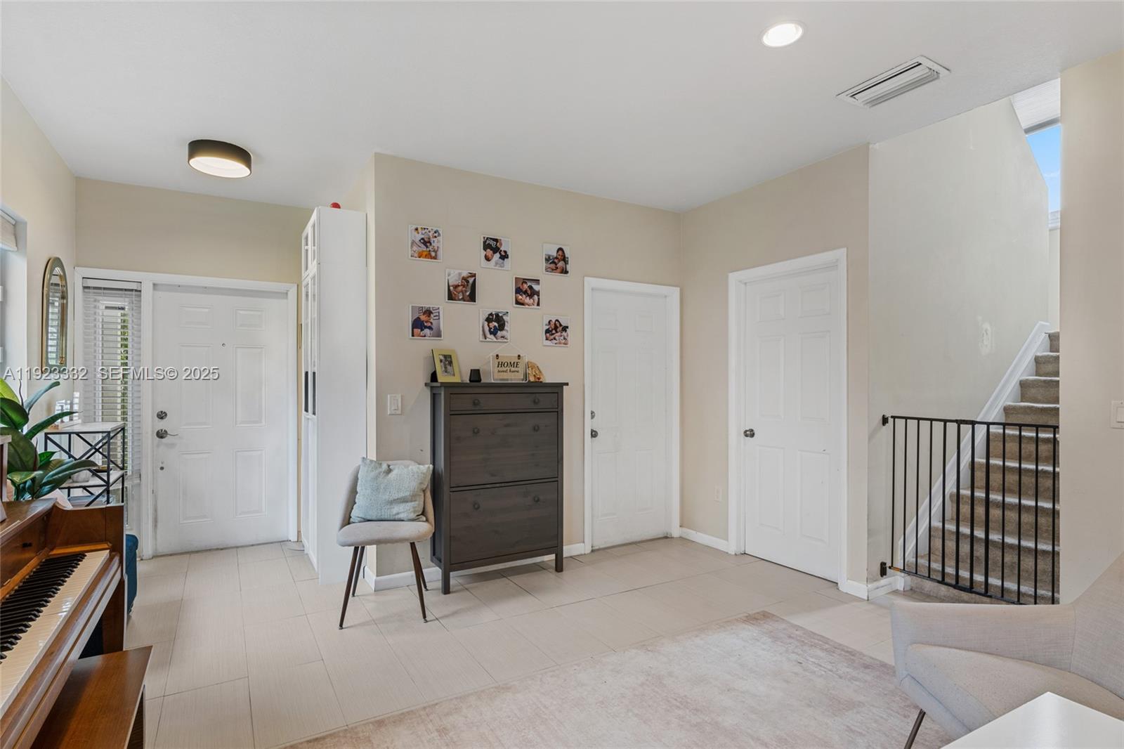 396 Northeast 33rd Terrace Homestead, FL 33033 - Photo 14 of 42 a view of kitchen with furniture and wooden floor