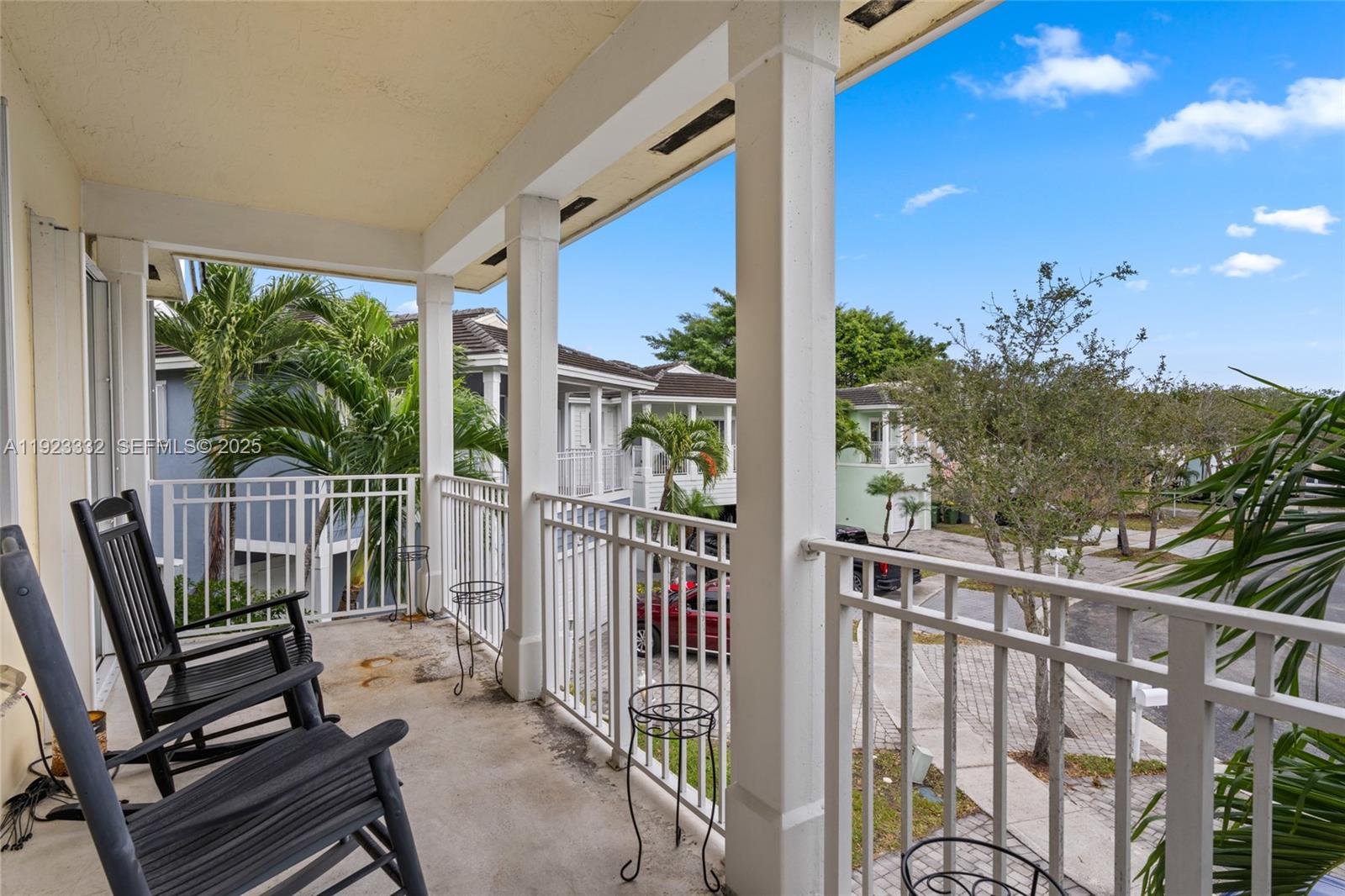 396 Northeast 33rd Terrace Homestead, FL 33033 - Photo 26 of 42 a view of a balcony with wooden floor