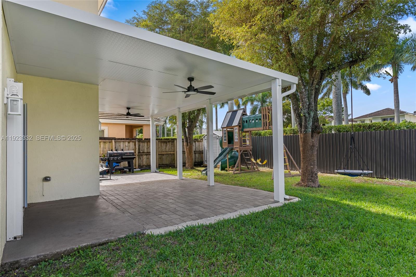396 Northeast 33rd Terrace Homestead, FL 33033 - Photo 33 of 42 a view of a house with backyard and porch