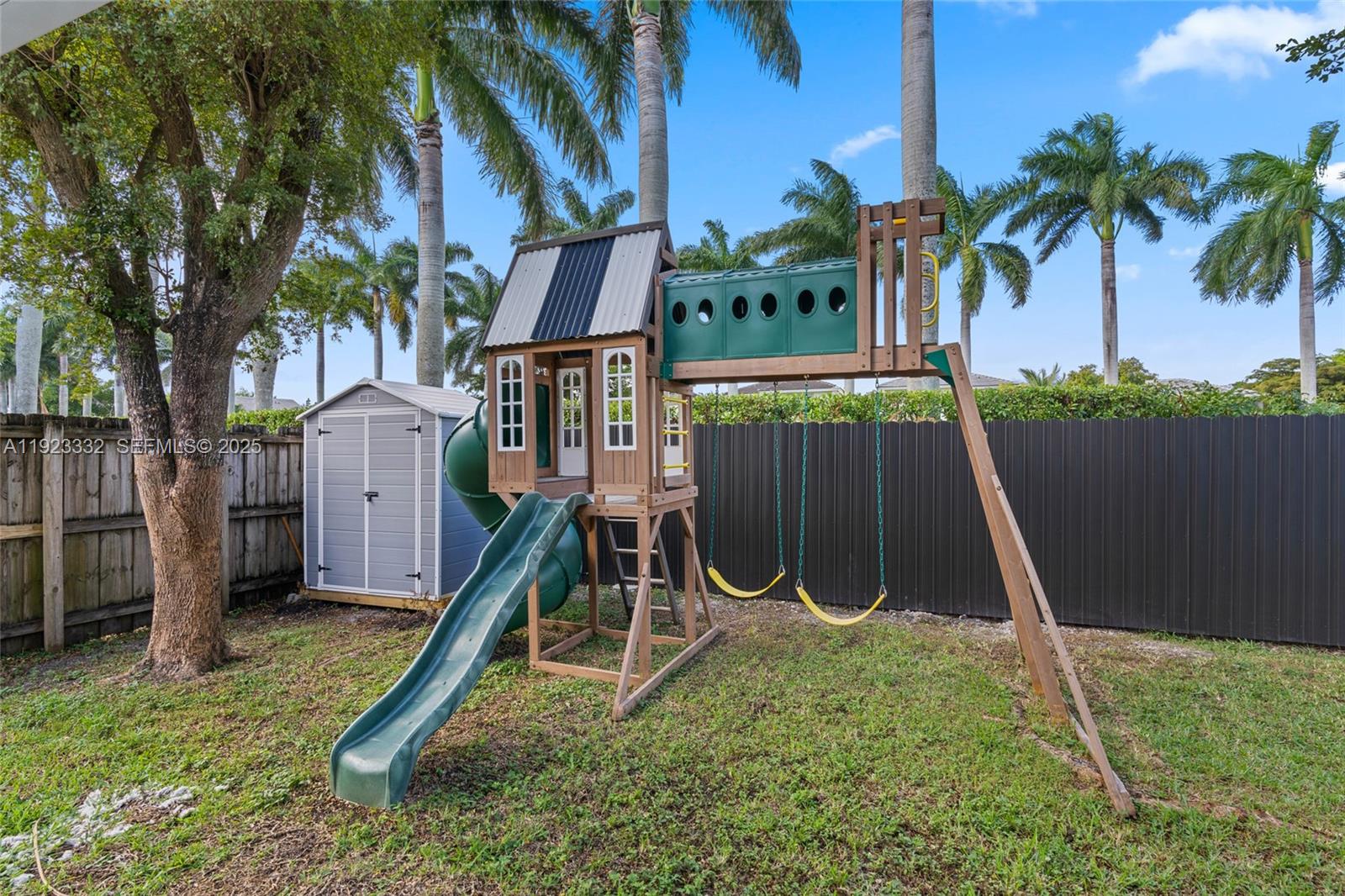 396 Northeast 33rd Terrace Homestead, FL 33033 - Photo 35 of 42 a garden with tall trees