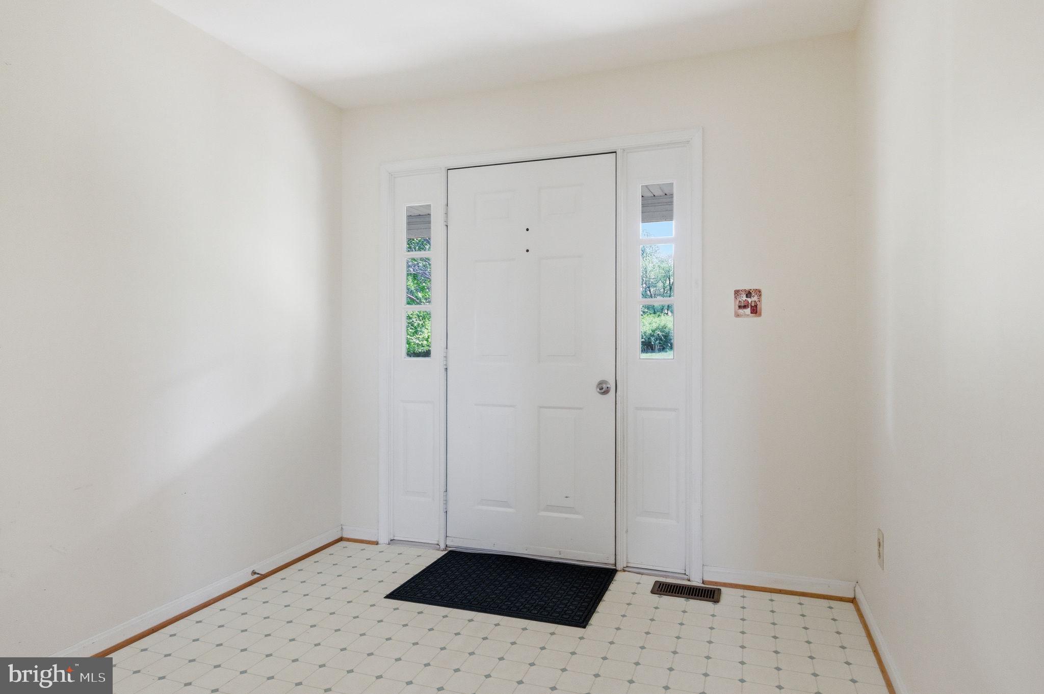 4004 Indian Run Road Amissville, VA 20106 - Photo 25 of 52 Inviting Foyer Entrance with cost closet