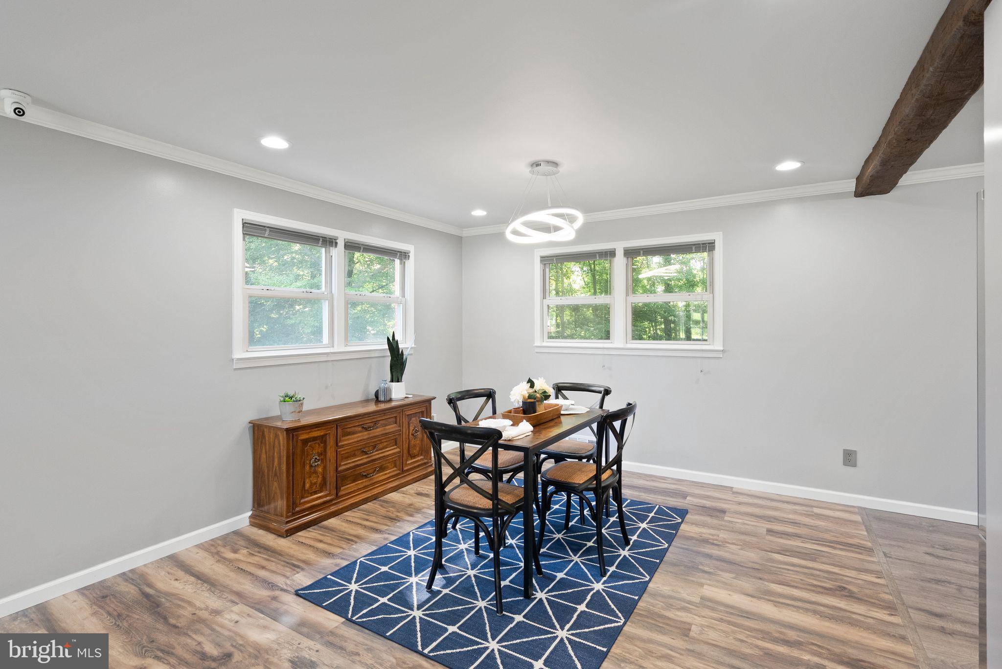 5634 Inverchapel Road Springfield, VA 22151 - Photo 17 of 62 a view of a dining room with furniture and window