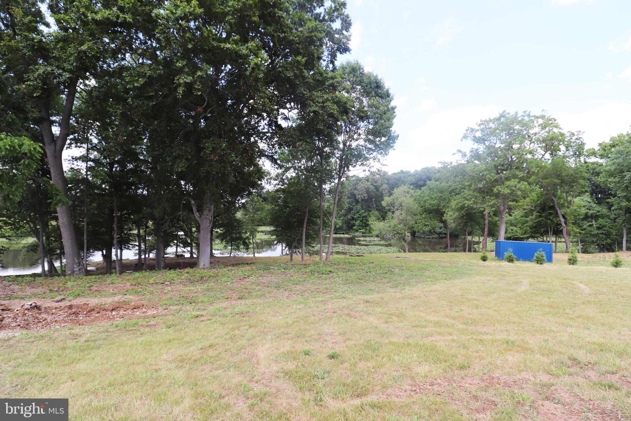 1481 Bunker Hill Road Middletown, DE 19709 - Photo 8 of 25 a view of tennis ground with trees in the background
