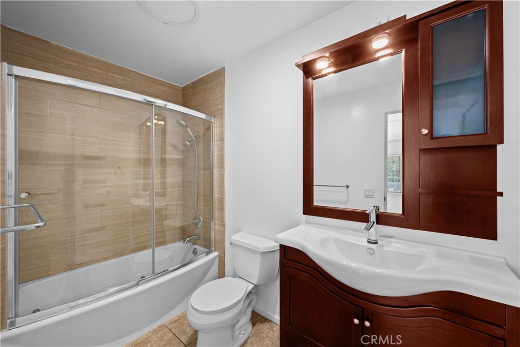 2940 North Verdugo Road, Unit 214 Glendale, CA 91208 - Photo 6 of 10 a bathroom with a sink a toilet and shower