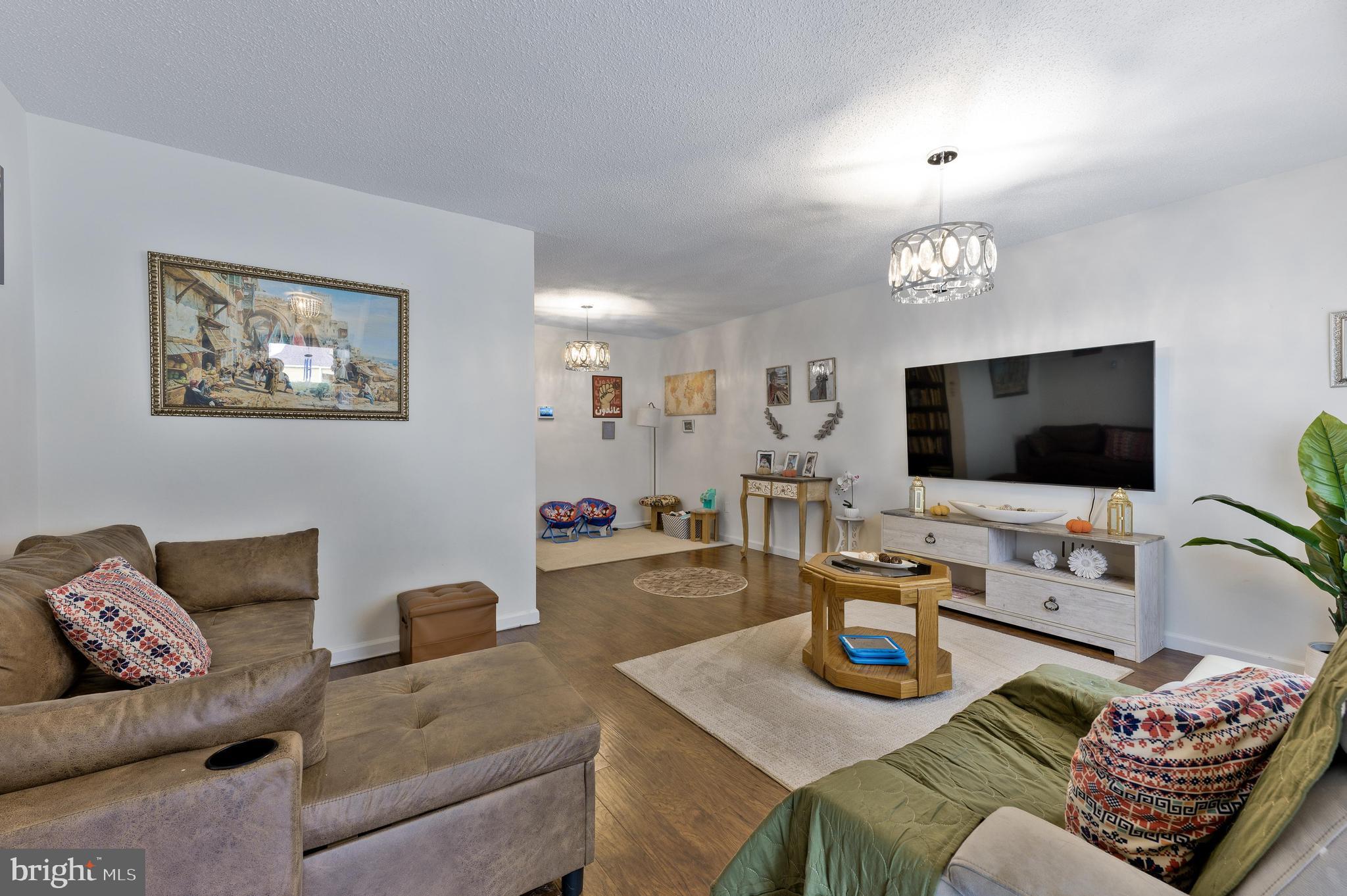 56 Dover Drive Lindenwold, NJ 08021 - Photo 5 of 20 a living room with furniture and a flat screen tv