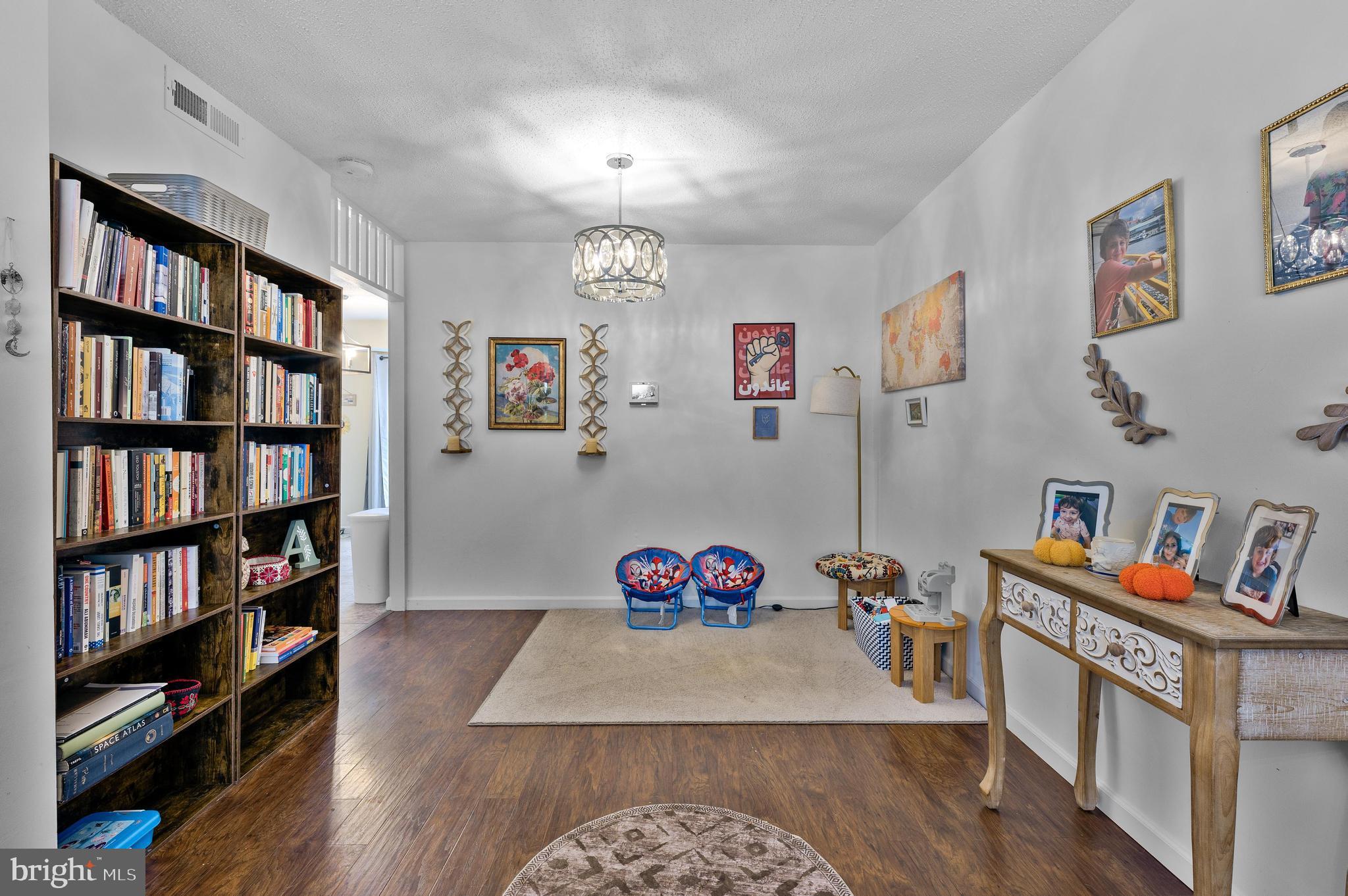 56 Dover Drive Lindenwold, NJ 08021 - Photo 7 of 20 a bedroom with furniture and a book shelf