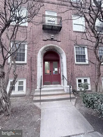 a front view of a house with a door