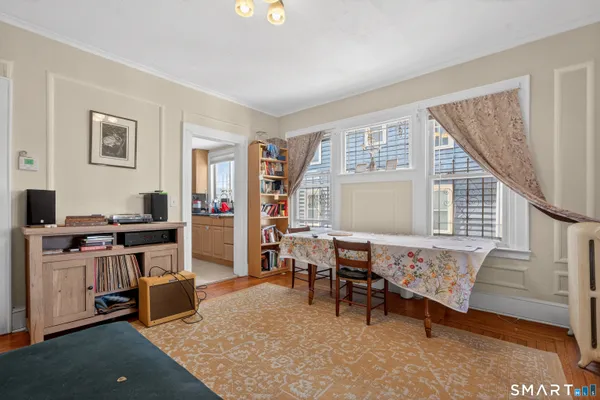 a view of a livingroom with furniture and window