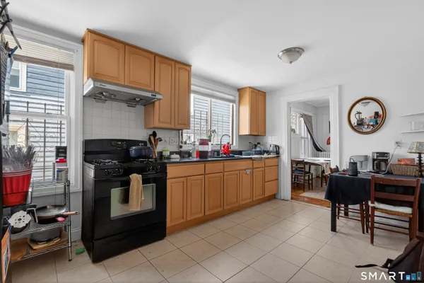 a kitchen with a cabinets and appliances