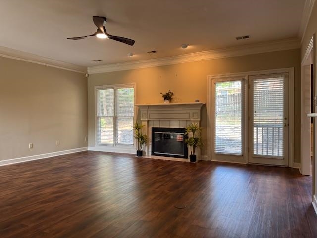 8668 Stablemill Lane Memphis, TN 38016 - Photo 12 of 36 a view of an empty room with wooden floor and a window