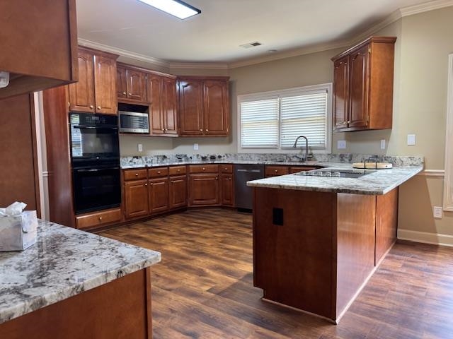 8668 Stablemill Lane Memphis, TN 38016 - Photo 2 of 36 a kitchen with stainless steel appliances granite countertop a stove a sink dishwasher a refrigerator and a oven