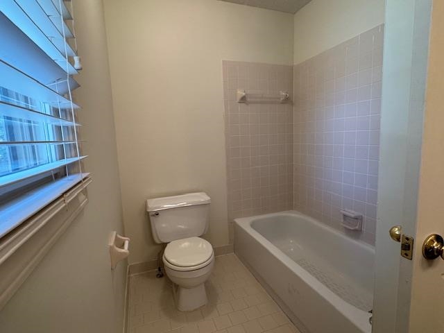 8668 Stablemill Lane Memphis, TN 38016 - Photo 22 of 36 a white toilet sitting next to a bathtub
