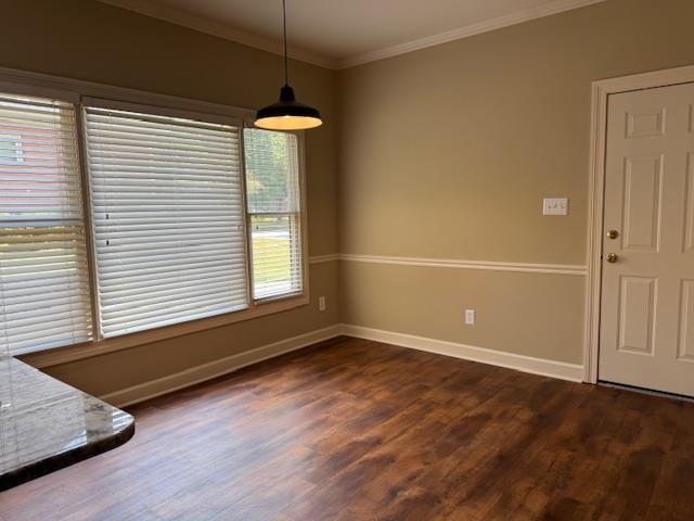 8668 Stablemill Lane Memphis, TN 38016 - Photo 9 of 36 an empty room with wooden floor and windows