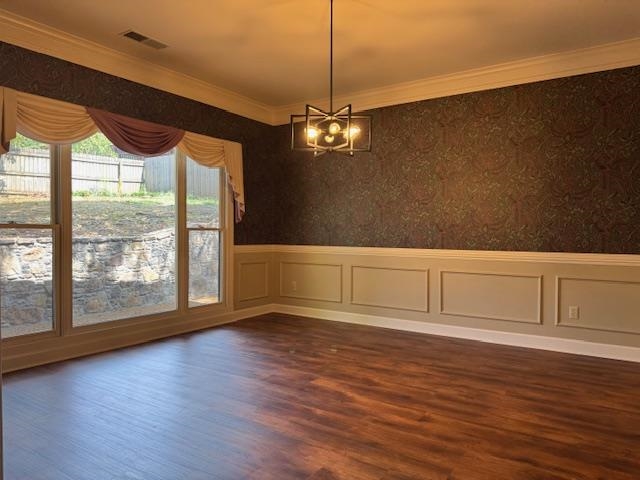 8668 Stablemill Lane Memphis, TN 38016 - Photo 10 of 36 a view of an empty room with wooden floor and a window