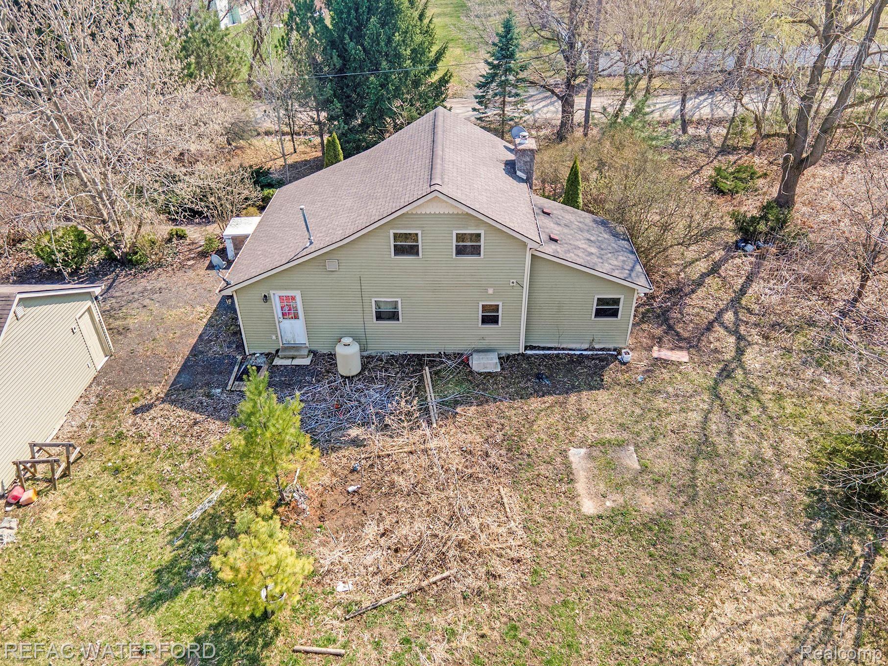 13604 Kimball Road Allenton, MI 48002 - Photo 22 of 32 Aerial view of back of house.