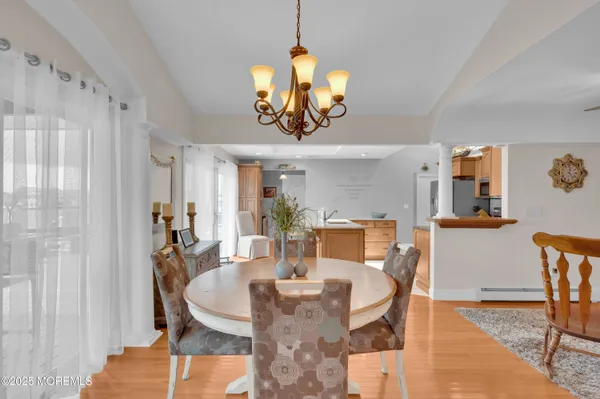 a bathroom with a sink a mirror and a shower