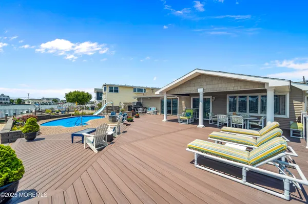 a view of a terrace with seating area