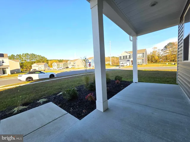 a view of a city street from a balcony