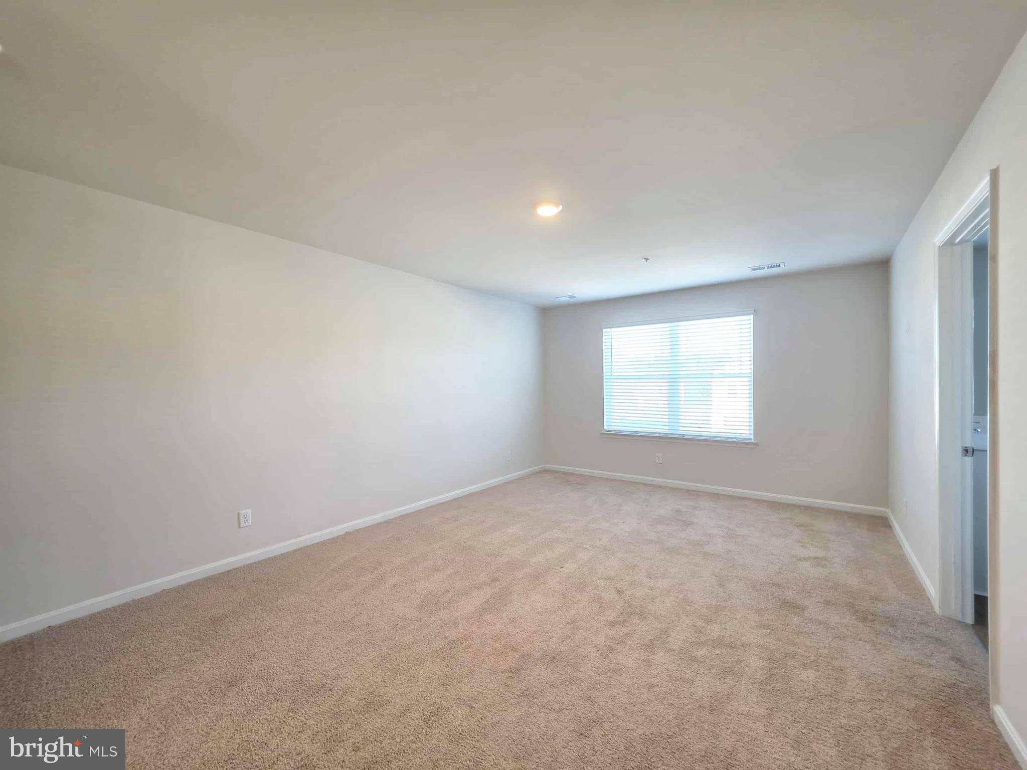 374 Robbins Farm Road Cambridge, MD 21613 - Photo 31 of 48 an empty room with a window